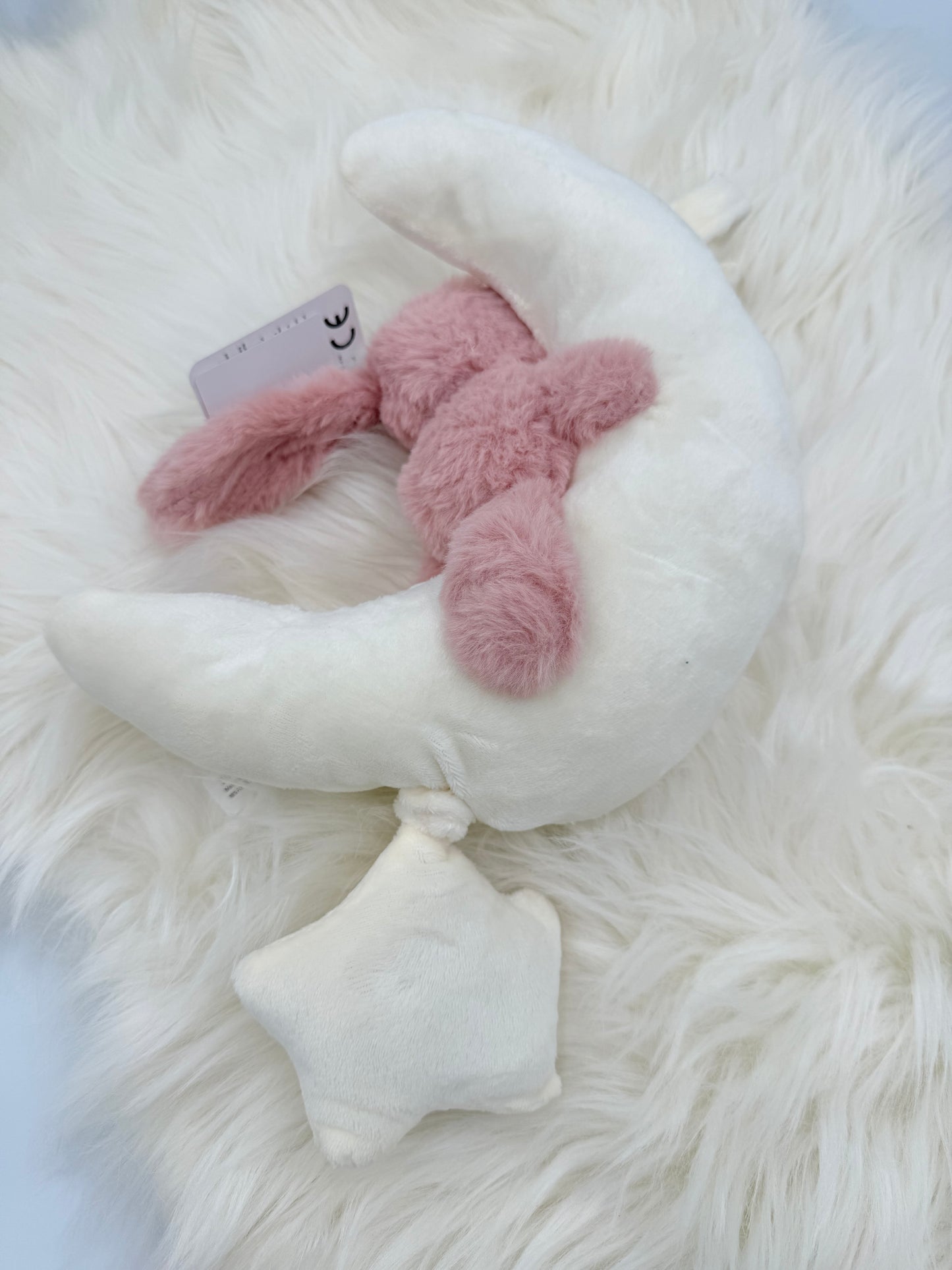 Konijn op de maan muzikale knuffel roze