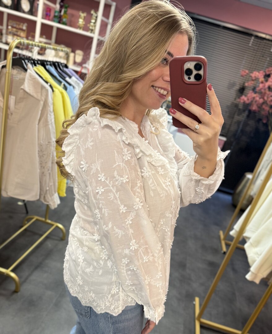 Witte blouse met bloemen