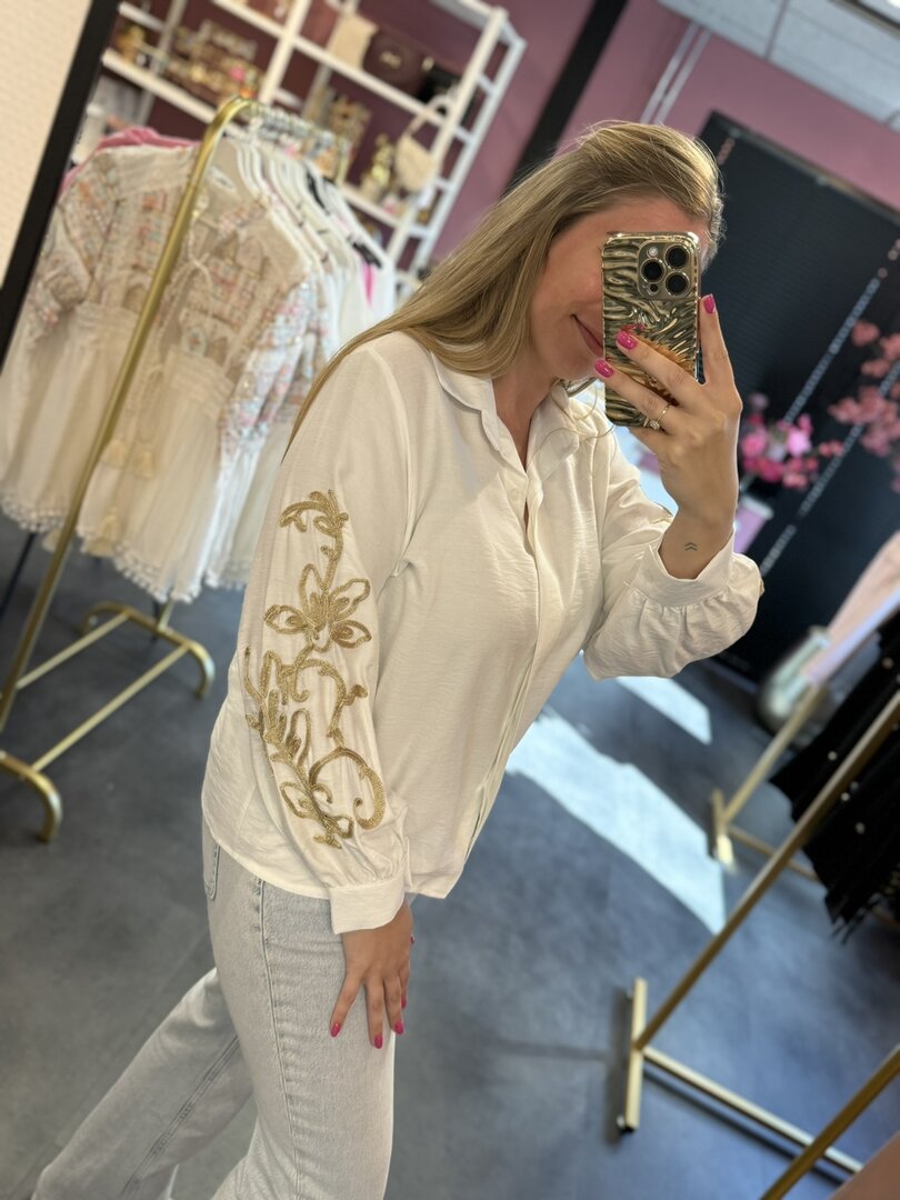 Blouse wit met gouden details