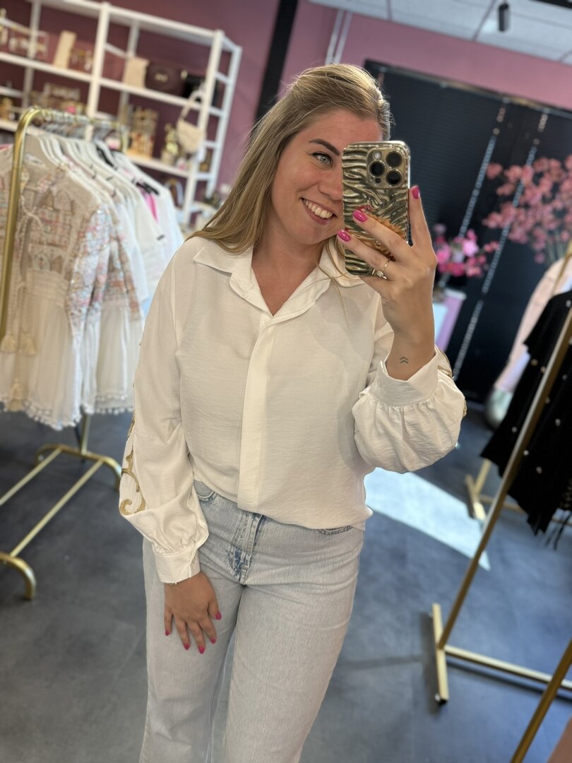 Blouse wit met gouden details