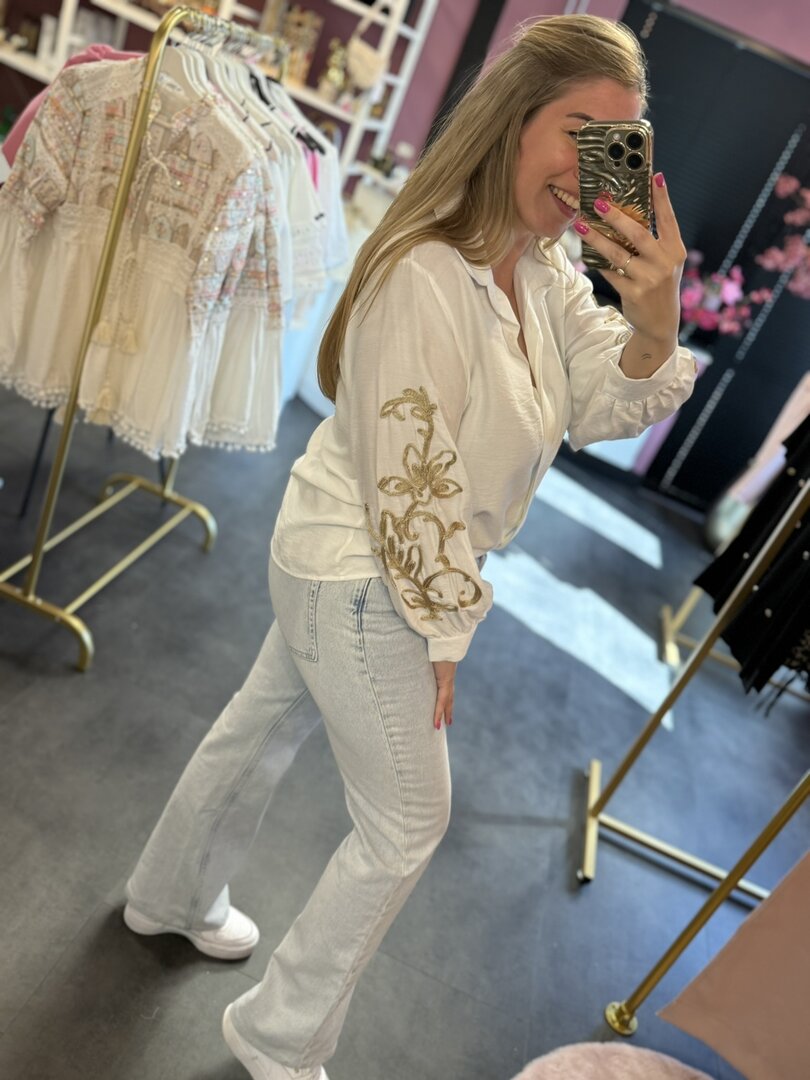 Blouse wit met gouden details
