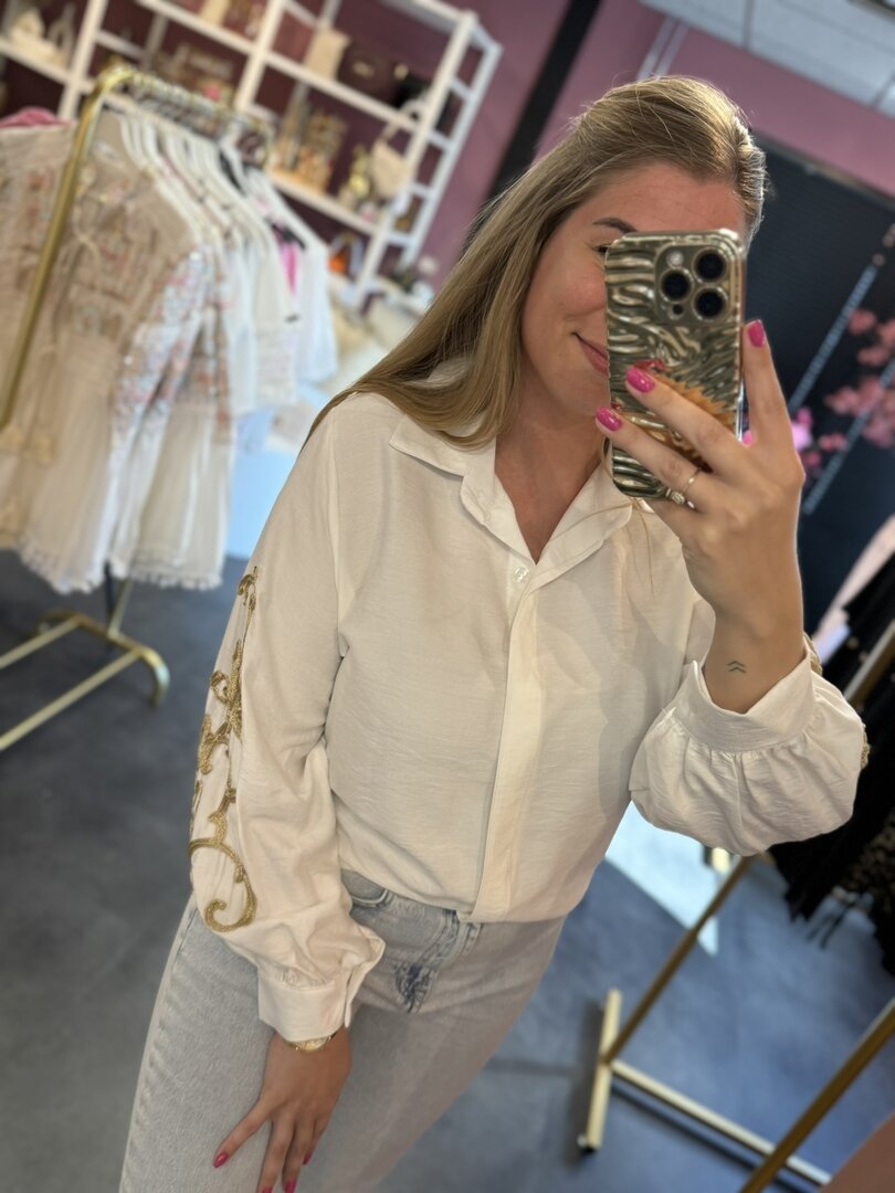 Blouse wit met gouden details